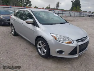 2014 Ford Focus SE with VIN 1FADP3F20EL244086, listed as a IAAI auction lot 41878168 with 139,075 mi miles. Bid and sale history available at carsss.com. Image 1.