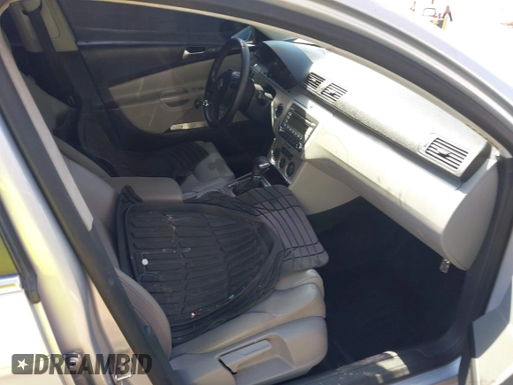 2009 Volkswagen Passat Komfort z VIN WVWJK73C19E078820, wystawiony jako IAAI lot #41823121 z przebiegiem 118 002 mil mil oraz . Historia ofert i sprzedaży dostępna na DreamBid. Obrazek 5.