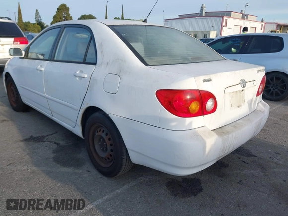 2004 Toyota Corolla CE with VIN JTDBR32E042025208, listed as a IAAI auction lot 41934485 with 299,999 mi miles. Bid and sale history available at carsss.com. Image 3.