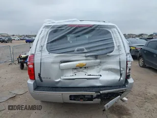 2014 Chevrolet Tahoe LTZ z VIN 1GNSCCE04ER159110, wystawiony jako IAAI lot #41615653 z przebiegiem 171 422 mil mil oraz . Historia ofert i sprzedaży dostępna na DreamBid. Obrazek 16.