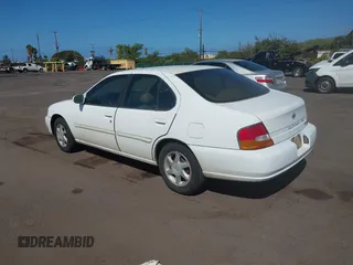 1999 Nissan Altima XE with VIN 1N4DL01D2XC125672, listed as a IAAI auction lot 41379153 with 183,685 mi miles. Bid and sale history available at carsss.com. Image 3.