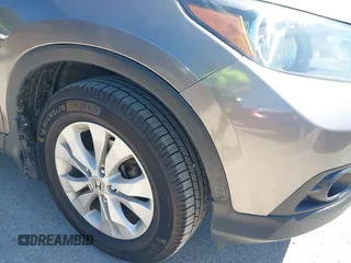 2014 Honda CR-V EX-L with VIN 2HKRM3H74EH514278, listed as a IAAI auction lot 42223596 with 148,477 mi miles and . Bid and sale history available at carsss.com. Image 6.