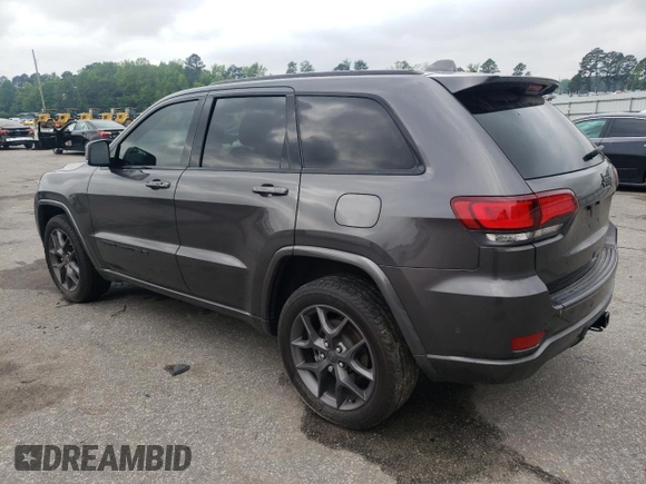 2021 Jeep Grand Cherokee 80th Anniversary z VIN 1C4RJEBG7MC679667, wystawiony jako Copart lot #54167225 z przebiegiem 77 268 mil mil oraz Szkoda całkowita • Salvage title. Historia ofert i sprzedaży dostępna na DreamBid. Obrazek 2.