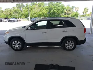 2013 Kia Sorento LX with VIN 5XYKT3A69DG370190, listed as a IAAI auction lot 42456161 with 170,196 mi miles and . Bid and sale history available at DreamBid. Image 14.