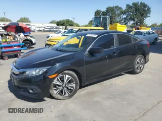 2018 Honda Civic EX-T with VIN JHMFC1F3XJX033118, listed as a Copart auction lot 61295035 with 138,909 mi miles and Salvage title. Bid and sale history available at DreamBid. Image 1.