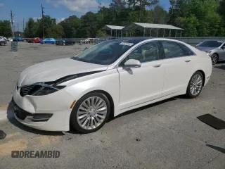 2015 Lincoln MKZ z VIN 3LN6L2GK7FR607330, wystawiony jako Copart lot #52520855 z przebiegiem 33 743 mil mil oraz Szkoda całkowita • Salvage title. Historia ofert i sprzedaży dostępna na DreamBid. Obrazek 1.