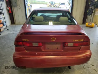 1997 Toyota Camry LE z VIN 4T1BG22K1VU033230, wystawiony jako Copart lot #52619265 z przebiegiem 301 543 mil mil oraz Szkoda całkowita • Salvage title. Historia ofert i sprzedaży dostępna na DreamBid. Obrazek 6.