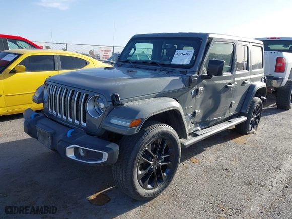 2023 Jeep Wrangler 4xe Sahara with VIN 1C4JJXP68PW661190, listed as a IAAI auction lot 41816483 with 41,877 mi miles. Bid and sale history available at carsss.com. Image 17.