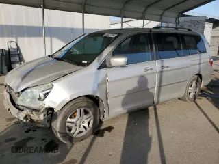 2005 Honda Odyssey EX-L z VIN 5FNRL38745B020455, wystawiony jako Copart lot #85877544 z przebiegiem 332 069 mil mil oraz Szkoda całkowita • Salvage title. Historia ofert i sprzedaży dostępna na DreamBid. Obrazek 1.