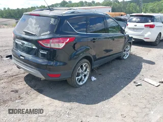 2015 Ford Escape Titanium с VIN 1FMCU0J99FUA73590, выставлен на аукционе IAAI как лот 42152021 с пробегом Не указан миль и . История ставок и продаж доступна на DreamBid. Изображение 4.