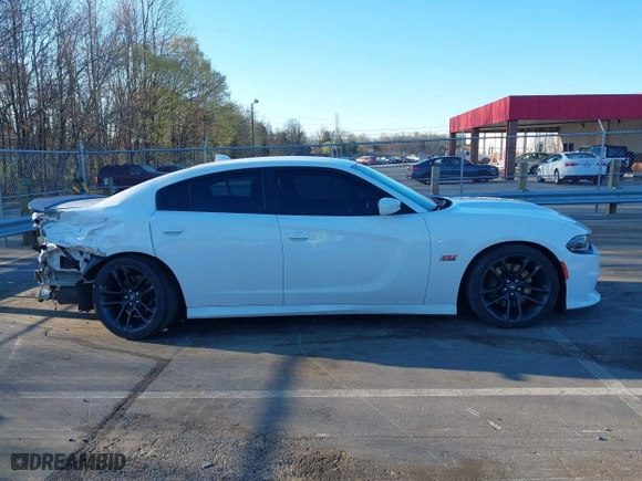 2020 Dodge Charger Scat Pack Widebody with VIN 2C3CDXGJ3LH244092, listed as a IAAI auction lot 41828294 with 107,568 mi miles. Bid and sale history available at carsss.com. Image 14.