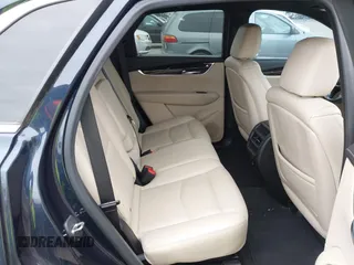 2017 Cadillac XT5 FWD with VIN 1GYKNARS2HZ188557, listed as a IAAI auction lot 41840764 with 104,524 mi miles. Bid and sale history available at carsss.com. Image 8.