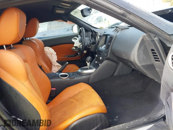 2012 Nissan 370Z Touring with VIN JN1AZ4EH4CM561303, listed as a IAAI auction lot 41788638 with 111,958 mi miles. Bid and sale history available at carsss.com. Image 5.