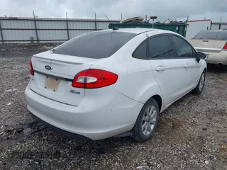 2012 Ford Fiesta SE with VIN 3FADP4BJ0CM220742, listed as a IAAI auction lot 42207303 with 175,875 mi miles and . Bid and sale history available at DreamBid. Image 4.