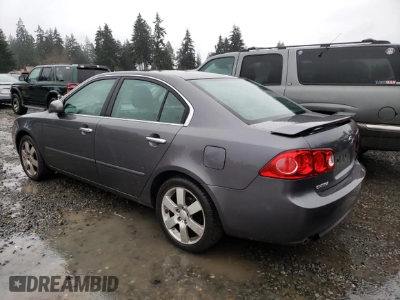 2007 Kia Optima EX with VIN KNAGE124375134243, listed as a Copart auction lot 86664454 with 136,700 mi miles and Salvage Title. Bid and sale history available at carsss.com. Image 2.