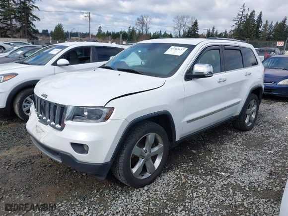 2013 Jeep Grand Cherokee Limited with VIN 1C4RJFBT0DC619216, listed as a IAAI auction lot 41703137 with 142,577 mi miles. Bid and sale history available at carsss.com. Image 2.