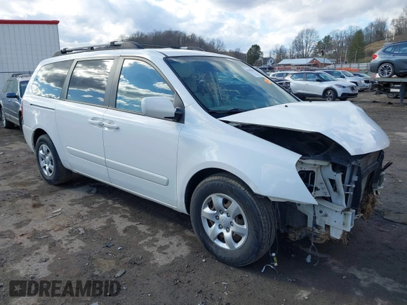 2008 Kia Sedona LX with VIN KNDMB233486240593, listed as a IAAI auction lot 41639585 with 173,067 mi miles. Bid and sale history available at carsss.com. Image 1.