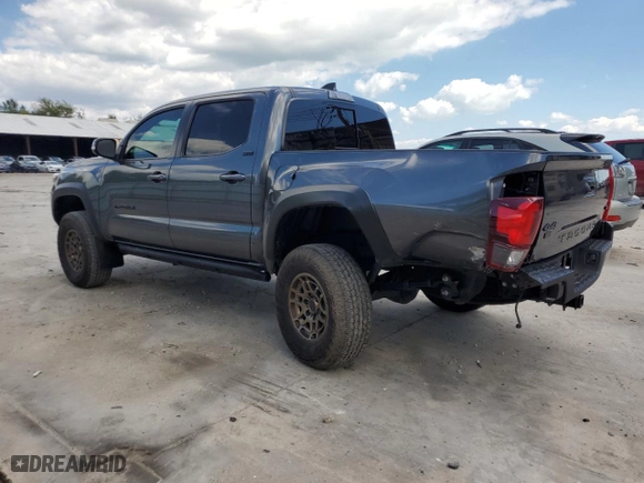 2023 Toyota Tacoma 4WD SR with VIN 3TMCZ5AN6PM533553, listed as a Copart auction lot 73061484 with 24,915 mi miles and Salvage Title. Bid and sale history available at carsss.com. Image 2.