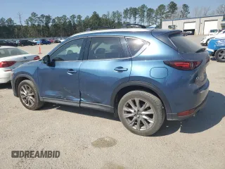 2021 Mazda CX-5 Grand Touring with VIN JM3KFADM0M0391349, listed as a Copart auction lot 48886685 with 38,923 mi miles and Clean Title. Bid and sale history available at carsss.com. Image 2.
