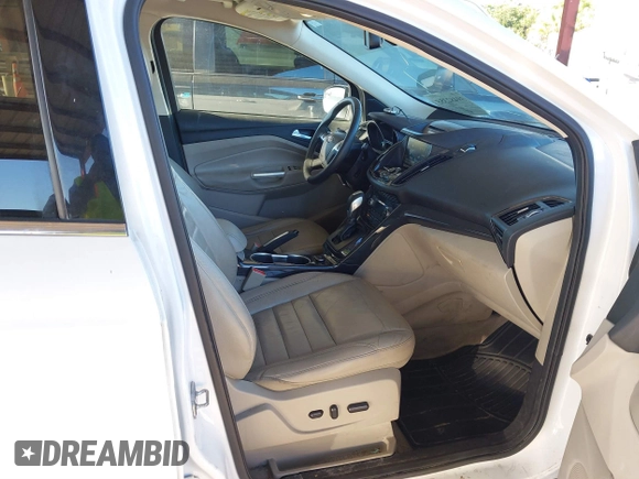 2015 Ford Escape Titanium with VIN 1FMCU0J96FUA48615, listed as a IAAI auction lot 39482355 with 186,340 mi miles and . Bid and sale history available at DreamBid. Image 5.