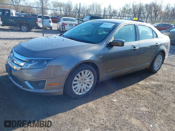 2010 Ford Fusion Hybrid z VIN 3FADP0L35AR423330, wystawiony jako IAAI lot #41972619 z przebiegiem 154 026 mil mil oraz . Historia ofert i sprzedaży dostępna na DreamBid. Obrazek 2.