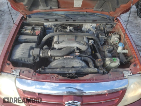 2004 Suzuki XL7 LX z VIN JS3TX92V744103907, wystawiony jako Copart lot #42055785 z przebiegiem 194 672 mil mil oraz Szkoda całkowita • Salvage title. Historia ofert i sprzedaży dostępna na DreamBid. Obrazek 13.