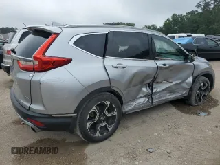 2018 Honda CR-V Touring with VIN 7FARW1H91JE039573, listed as a Copart auction lot 54144205 with 87,704 mi miles and Salvage Title. Bid and sale history available at DreamBid. Image 3.
