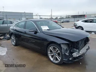 2019 BMW 4 Series 430i xDrive with VIN WBA4J3C50KBL09320, listed as a IAAI auction lot 41677736 with 73,277 mi miles. Bid and sale history available at carsss.com. Image 1.