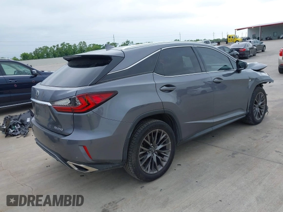 2017 Lexus RX 350 with VIN 2T2BZMCA2HC103122, listed as a IAAI auction lot 42316878 with 135,936 mi miles and . Bid and sale history available at DreamBid. Image 4.