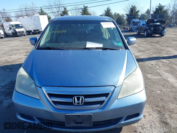 2005 Honda Odyssey EX-L with VIN 5FNRL38765B076591, listed as a IAAI auction lot 41624354 with 172,698 mi miles and . Bid and sale history available at DreamBid. Image 11.