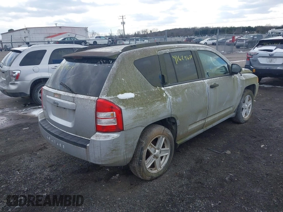 2007 Jeep Compass Sport with VIN 1J8FF47W17D142461, listed as a IAAI auction lot 41629674 with 153,516 mi miles. Bid and sale history available at carsss.com. Image 4.