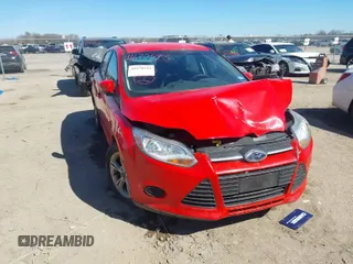 2014 Ford Focus SE with VIN 1FADP3F24EL168615, listed as a IAAI auction lot 41670543 with 157,141 mi miles. Bid and sale history available at carsss.com. Image 1.