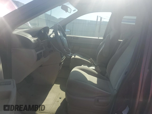 2006 Ford Freestar SE z VIN 2FMZA51636BA02932, wystawiony jako Copart lot #52506005 z przebiegiem 74 512 mil mil oraz Szkody całkowita. Historia ofert i sprzedaży dostępna na DreamBid. Obrazek 7.