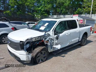 2023 Ford F-150 Lightning Pro с VIN 1FTVW1EVXPWG27360, выставлен на аукционе IAAI как лот 42073228 с пробегом 25 519 миль миль и . История ставок и продаж доступна на DreamBid. Изображение 2.
