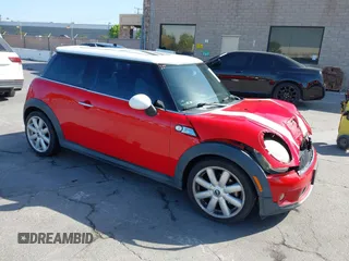 2009 MINI Hardtop S with VIN WMWMF73549TX40837, listed as a IAAI auction lot 42402992 with 132,956 mi miles and . Bid and sale history available at DreamBid. Image 1.