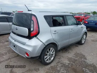 2017 Kia Soul + with VIN KNDJP3A59H7437610, listed as a IAAI auction lot 41892128 with 144,147 mi miles. Bid and sale history available at carsss.com. Image 4.