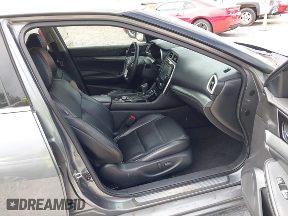2018 Nissan Maxima SL with VIN 1N4AA6AP6JC385831, listed as a IAAI auction lot 41947837 with 108,714 mi miles and . Bid and sale history available at DreamBid. Image 5.