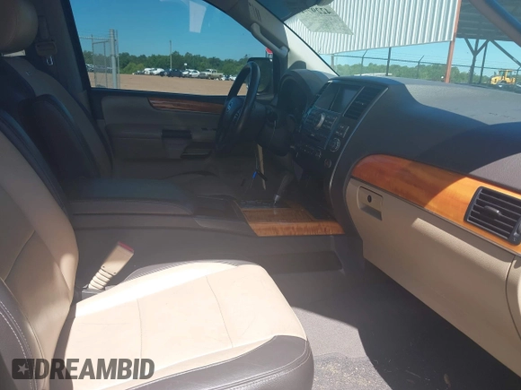 2014 Nissan Armada Platinum z VIN 5N1BA0NE9EN611807, wystawiony jako IAAI lot #42297717 z przebiegiem 199 541 mil mil oraz . Historia ofert i sprzedaży dostępna na DreamBid. Obrazek 5.