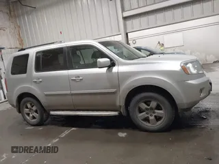 2011 Honda Pilot EX-L with VIN 5FNYF4H66BB029802, listed as a IAAI auction lot 42101545 with 240,127 mi miles and . Bid and sale history available at carsss.com. Image 13.