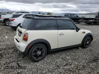 2007 MINI Hardtop with VIN WMWMF33567TT56922, listed as a Copart auction lot 56598665 with 66,605 mi miles and Salvage title. Bid and sale history available at DreamBid. Image 3.