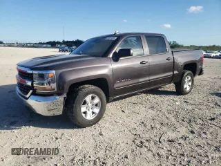 2016 Chevrolet Silverado 1500 LT with VIN 3GCPCREH9GG165205, listed as a Copart auction lot 82615504 with 201,150 mi miles and Salvage Title. Bid and sale history available at DreamBid. Image 1.