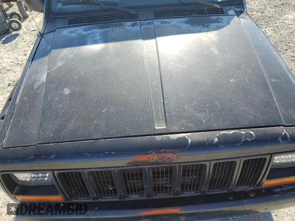 1997 Jeep Cherokee Country with VIN 1J4FJ78S2VL574492, listed as a Copart auction lot 88568685 with 244,465 mi miles and Salvage Title. Bid and sale history available at carsss.com. Image 11.