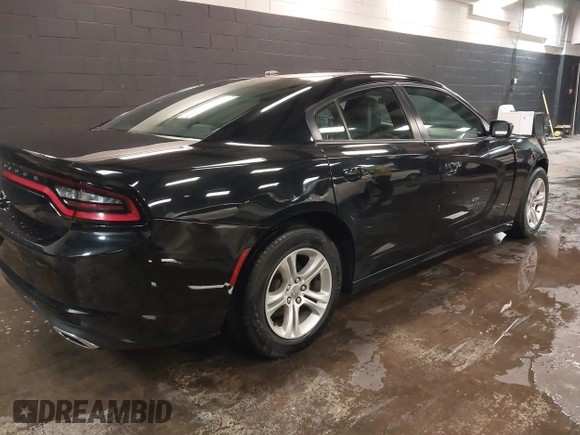 2021 Dodge Charger SXT with VIN 2C3CDXBG8MH541839, listed as a IAAI auction lot 41620879 with 79,889 mi miles. Bid and sale history available at carsss.com. Image 4.