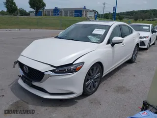 2021 Mazda Mazda6 Touring with VIN JM1GL1VM1M1603501, listed as a IAAI auction lot 39689276 with 70,727 mi miles. Bid and sale history available at carsss.com. Image 17.