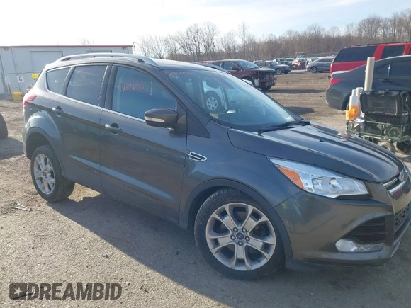 2015 Ford Escape Titanium with VIN 1FMCU9J90FUB58306, listed as a IAAI auction lot 41815151 with 136,835 mi miles. Bid and sale history available at carsss.com. Image 1.