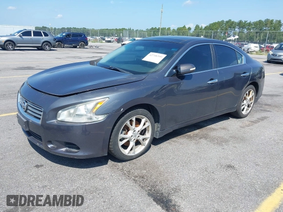 2013 Nissan Maxima SV with VIN 1N4AA5AP5DC815847, listed as a IAAI auction lot 42758399 with 168,056 mi miles and . Bid and sale history available at DreamBid. Image 2.