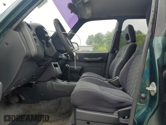 2000 Toyota RAV4 with VIN JT3GP10V5Y0044829, listed as a Copart auction lot 57051405 with 218,839 mi miles and Clean title. Bid and sale history available at DreamBid. Image 7.
