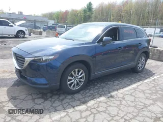 2019 Mazda CX-9 Touring z VIN JM3TCBCY6K0331905, wystawiony jako IAAI lot #42157842 z przebiegiem 84 211 mil mil oraz . Historia ofert i sprzedaży dostępna na DreamBid. Obrazek 20.