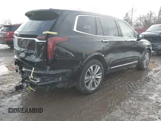 2025 Cadillac XT6 FWD Premium Luxury with VIN 1GYKPCRS6SZ104902, listed as a IAAI auction lot 41565224 with 4,735 mi miles. Bid and sale history available at carsss.com. Image 4.