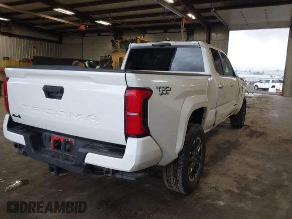 2025 Toyota Tacoma SR with VIN 3TMLB5JN2SM090394, listed as a IAAI auction lot 41916312 with 840 mi miles and . Bid and sale history available at DreamBid. Image 4.